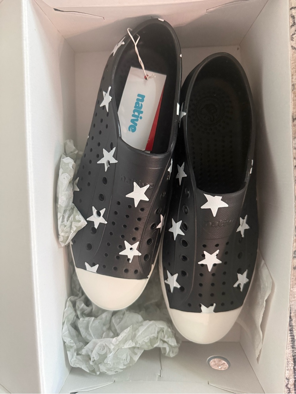 Native Adult Shoes Jefferson Slip-On in Black with White Stars